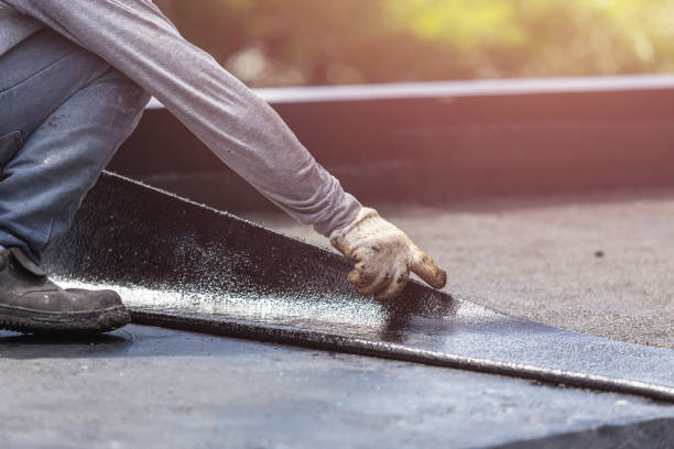 Professional Waterproofing technician working in Auburn, KS